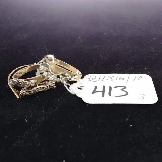 THREE 9CT GOLD AND DIAMOND BANDS 5.6gms