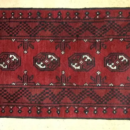 A small hand knotted Afghan Turkoman runner