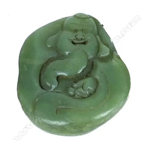 A Chinese green jade boulder carving