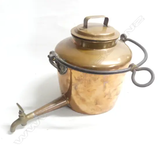 A large 19thC copper kettle with wrought iron swing handle handle and long spigot tap.