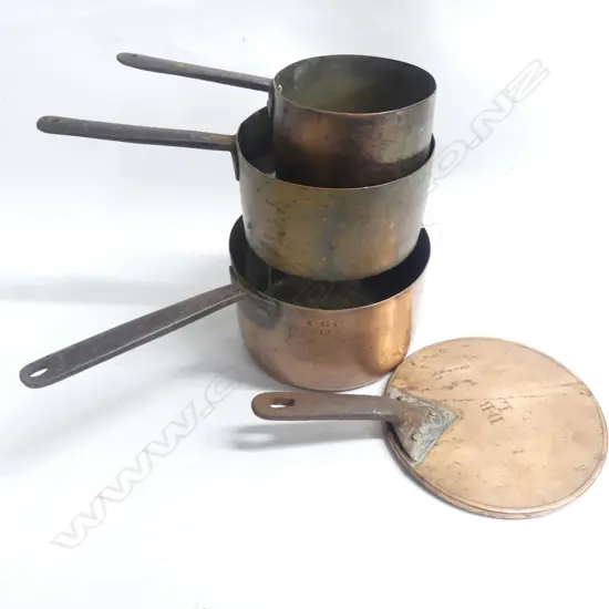 Three Victorian copper cooking pots graduated sizes one with fitted lid plain cylindrical bodies with riveted iron handles.  Dia.210. 185 and 145mm.