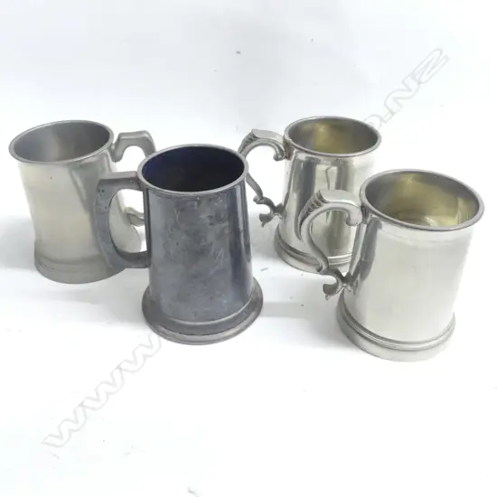 Four various pewter tankards, two plain and two with embellished handles, three of them with glass bottoms,