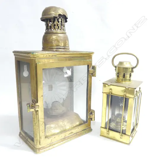 A large brass lantern, ex Waitara Wharf; and a replica smaller brass lantern.
