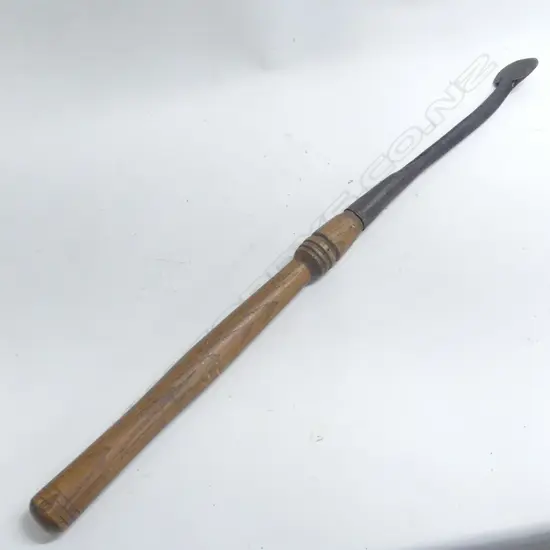A 19thC hand forged bark spud (bark remover) the steel blade with long socket fitting to the turned oak handle. L.810mm