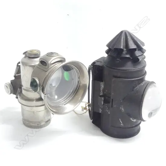 An ebonized tin late Victorian signal lamp with bull’s-eye lens