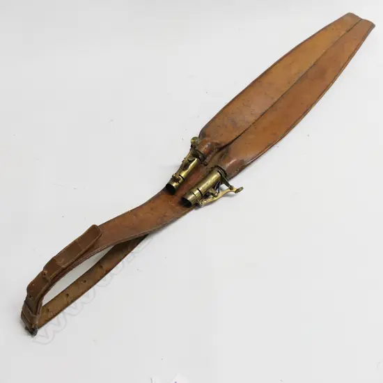 A double long leather shot charger, in fine near original condition.