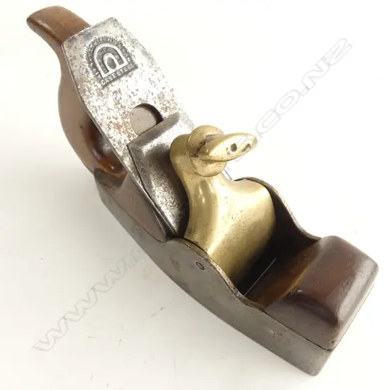 A 19thC mahogany infill Smoother Plane with steel body, brass keeper and screw.