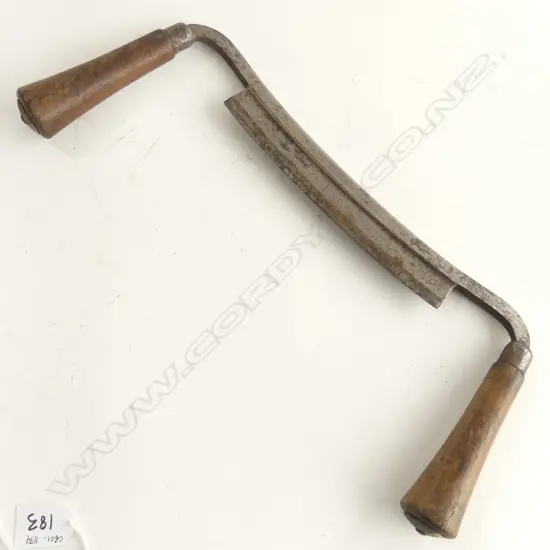 A wooden handled steel spoke shave, marked C E Jennings N.Y.  8