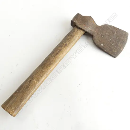 A colonial period settler's axe with steel blade on wooden handle.