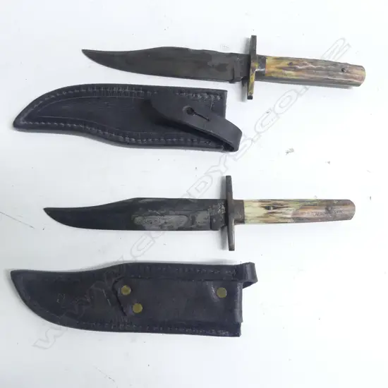 Two replica Wostenholm  clip blade sheath knives by I*XL Sheffield England with simulated antler handles,