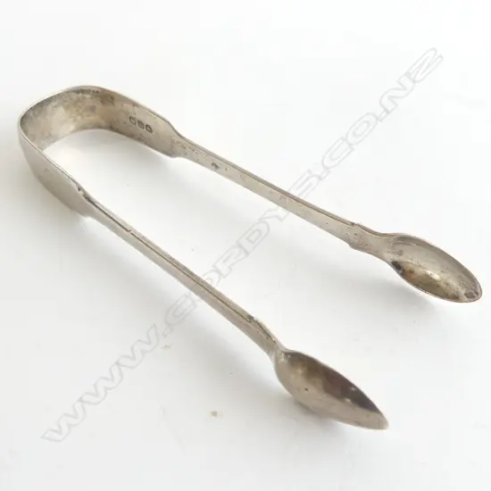 A pair of George III period fiddle pattern silver sugar tongs