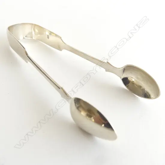 A pair of Victorian period fiddle pattern silver sugar tongs, Exeter 1866. 43gm