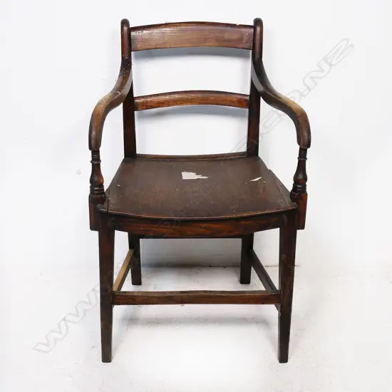 A mid-19thC walnut slat back arm chair, with mahogany paneled seat. Some repairs and old borer. H.820mm