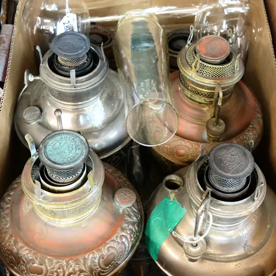 Six various paraffin lamps