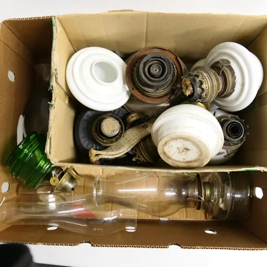 A box of early 19thC Kerosene light bases parts, along with three lamps