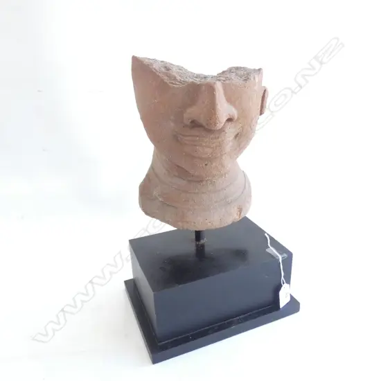 ANCIENT ? DAMAGED TERRACOTTA HALF BUDDHA HEAD. H.370mm