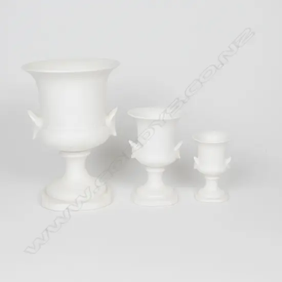 3 CREAM GLAZED C.L URN VASES; 679, 678, 666