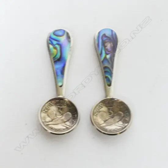 A pair of silver paua and threepence spoons