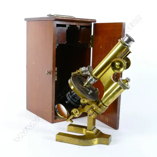A Bausch & Lomb Optical Co. brass microscope in mahogany case
