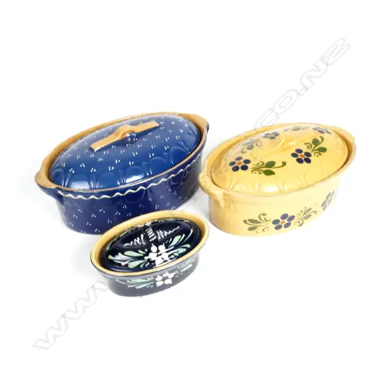 Two large vintage French lidded casserole pots