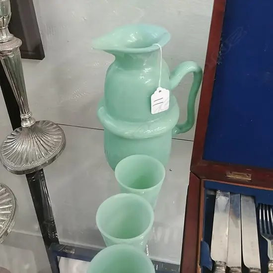 A Chinese Peking glass ewer and four beakers