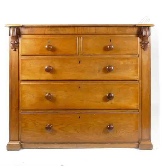 A Victorian oak chest of drawers