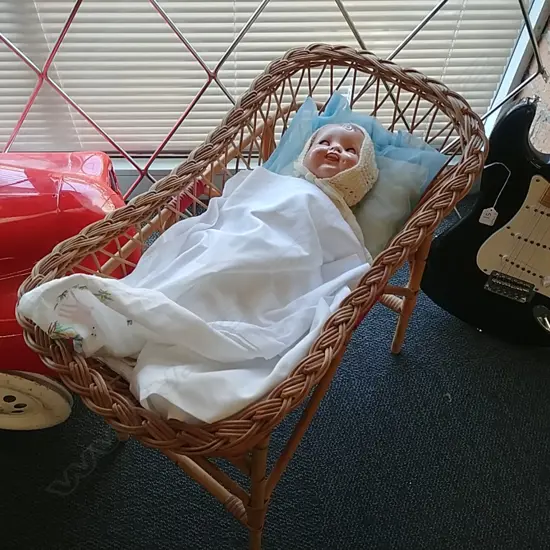 VINTAGE DOLL IN BASSINET