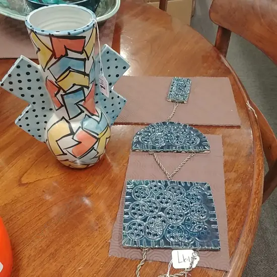 HANGING WALL TILES AND A TIPPETT ? VASE