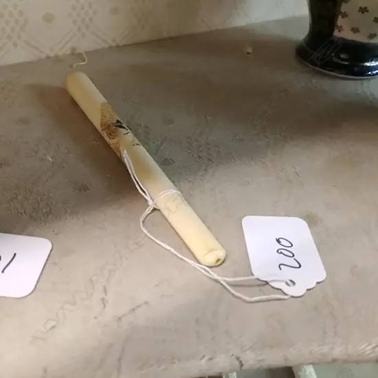 2 CARVED IVORY CIGARETTE HOLDERS