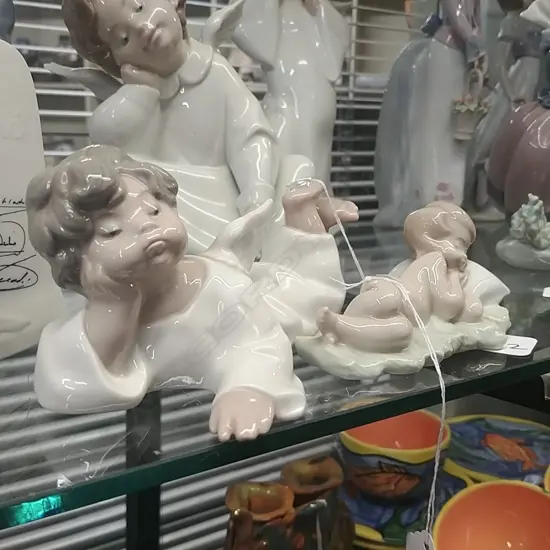 LLADRO ANGEL GOOFING OFF