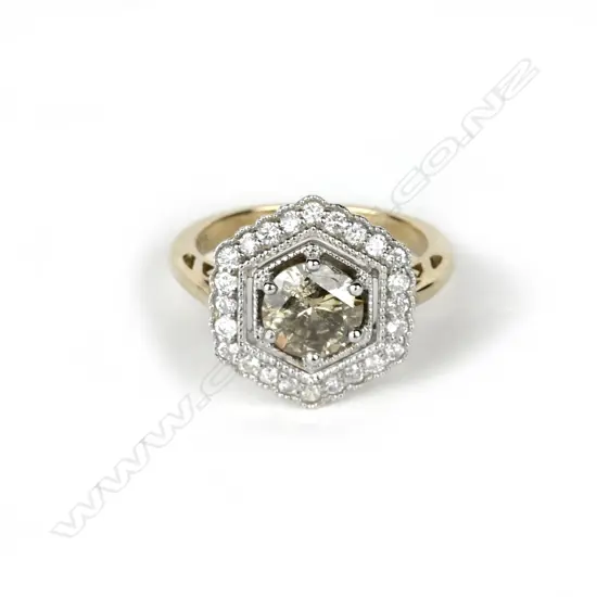 A Cartier style 9ct. gold and diamond cluster ring