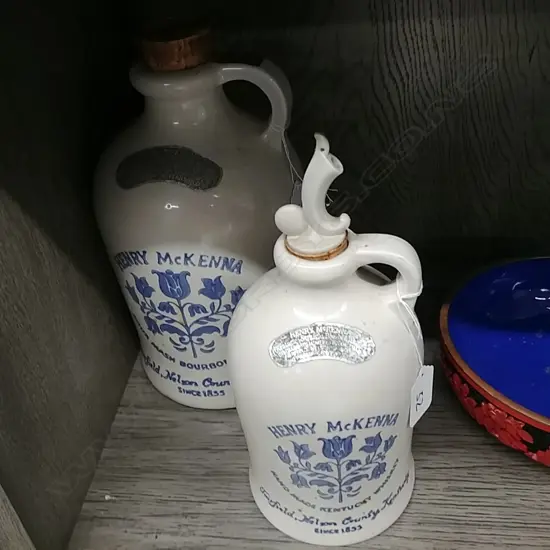 2 WHISKEY DECANTERS ( HENRY McKENNA)