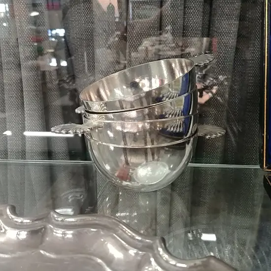 FOUR HEAVY SILVER PLATE FINGER BOWLS