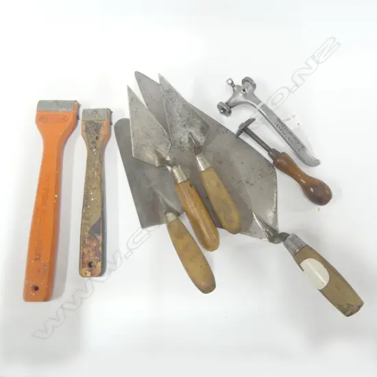 Three trowels, Goldblatt Masonry Bricklayer Skate Wheel Joint Raker Marker, and three scrapers (7)