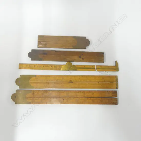 Four folding boxwood rules; a Lufkin No. 372R 12" rule and a rope & hawser gauge. (6)