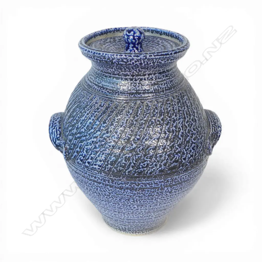 Mirek Smisek (1925–2013) substantial salt glazed lidded storage jar, deep blue glaze with band of repeating cut design around the shoulder. Maker's stamp lower side. A good well glazed example of his larger work. H.440mm. Image 1++