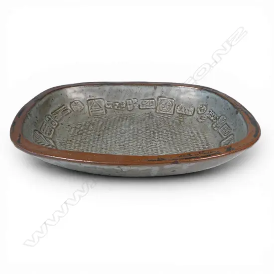 Len castle large rectangular form dish with impressed motifs similar to those used by Theo Schoon,