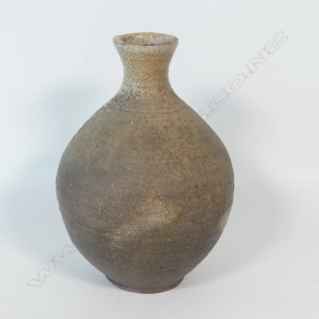 Estelle Martin anagama fired vase with a pale gloss glaze across the neck and shoulder, H.260mm. Incised potter's mark to base Image 1++