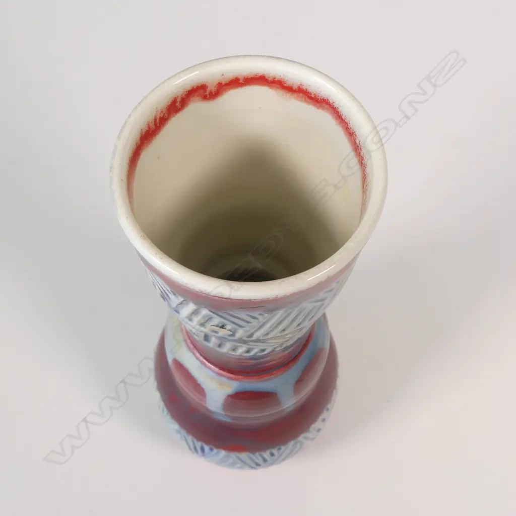 Anneke Borren vase, red, blue and ivory glaze, incised decoration to upper and lower sections. Potter's mark to base. H.300mm. Ex. Anneke Borren Collection. Image 1++