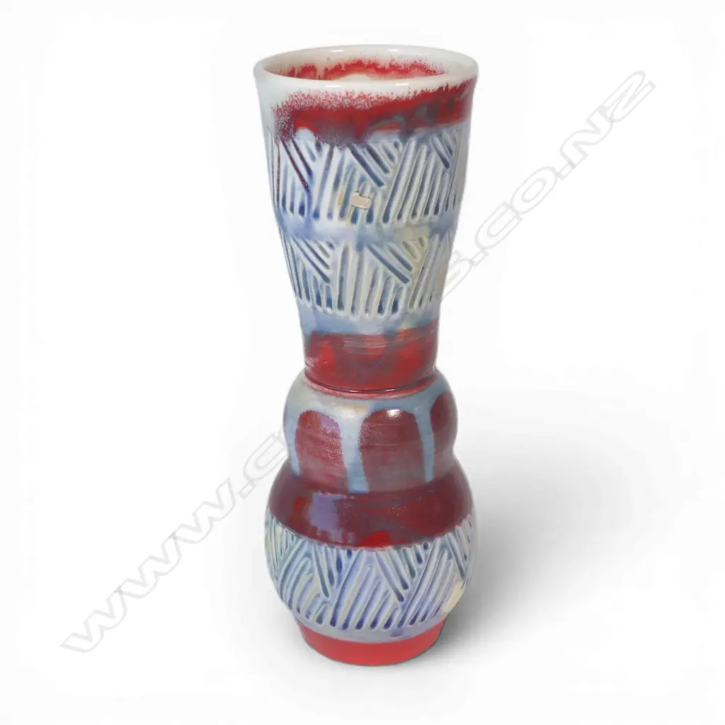 Anneke Borren vase, red, blue and ivory glaze, incised decoration to upper and lower sections. Potter's mark to base. H.300mm. Ex. Anneke Borren Collection. Image 1++