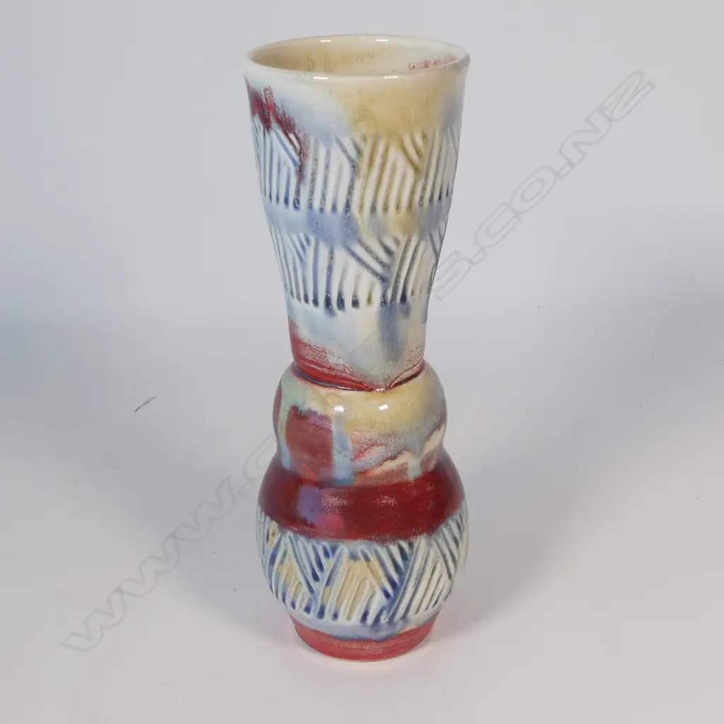 Anneke Borren vase, red, blue and ivory glaze, incised decoration to upper and lower sections. Potter's mark to base. H.300mm. Ex. Anneke Borren Collection. Image 1++