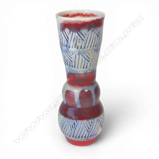 Anneke Borren vase, red, blue and ivory glaze, incised decoration to upper and lower sections. Potter's mark to base. H.300mm. Ex. Anneke Borren Collection.