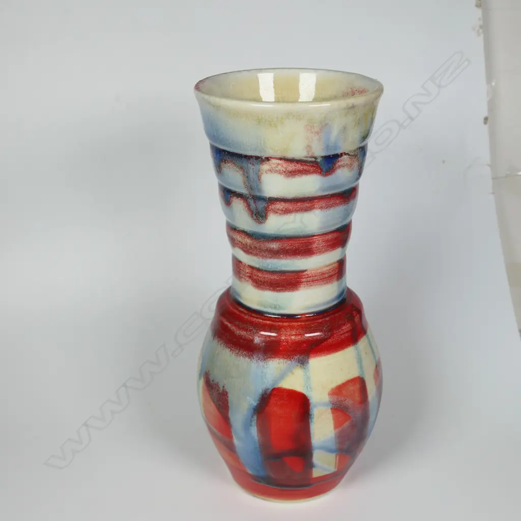Anneke Borren vase, red, blue and ivory glaze, ribbed neck. Potters mark and date to base, 2025. H.225mm. Ex. Anneke Borren Collection. Image 1++