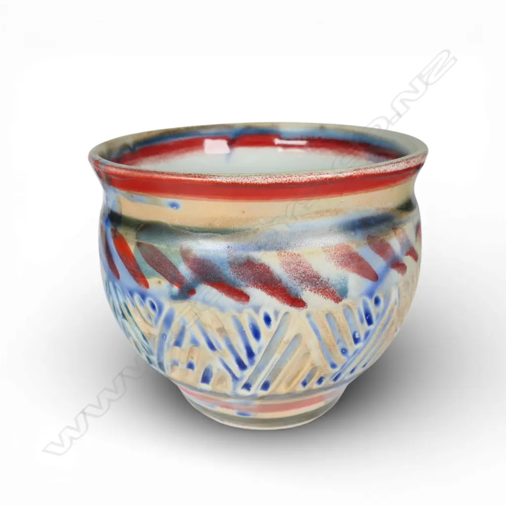 Anneke Borren bowl, red, blue and ivory glaze, incised decoration to body. Potters mark and date to base. H.145mm. Ex. Anneke Borren Collection. Image 1++