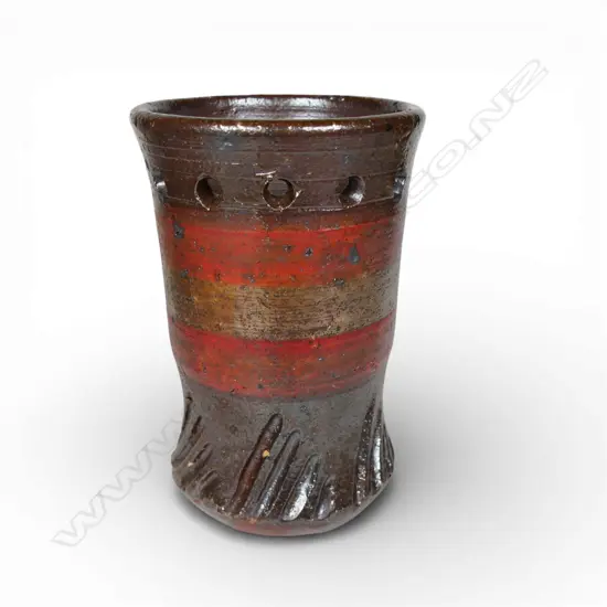 Anneke Borren small wood-fired vase, dark earthen lustre glaze, lower section with incised decoration, upper with ring of pierced circles. Potter's mark to base. H.125mm. Ex. Anneke Borren Collection.