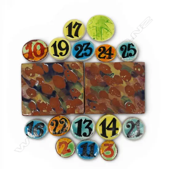 Two Warren Tippett glaze test tiles 85 x70mm and 15 hand painted exhibition number discs. Dia.30mm