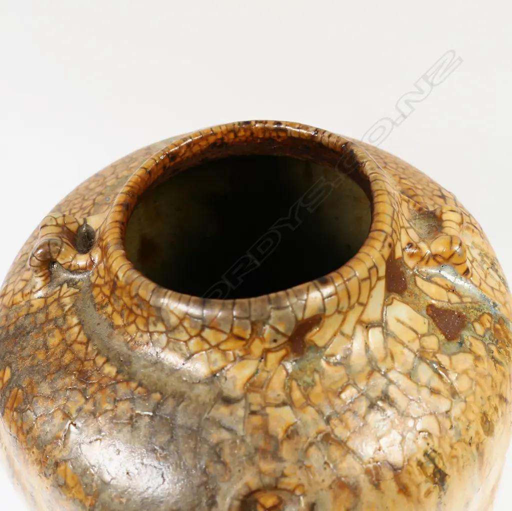 Greg Barron woodfired altered form vessel with dimples, drip glazed in earth-coloured tones, H.200 x Dia.130mm, maker's mark to base Image 1++