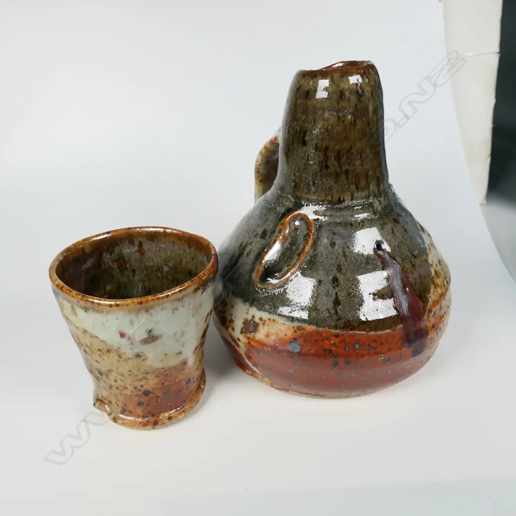 Michael O'Donnell flask and yunomi, shino glazed, one inscribed Tarariki. H.160mm. Ex. Anneke Borren Collection. Image 1++