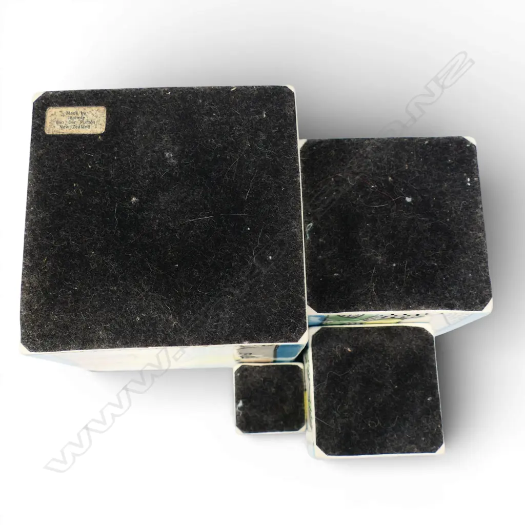 Four Jeannie Van der Putten graduated cubes, pastel glazed organic designs. Largest 115x115x115mm. Maker's sticker on base Image 1++