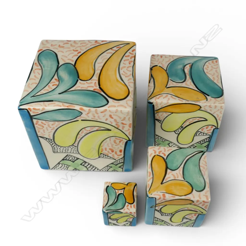 Four Jeannie Van der Putten graduated cubes, pastel glazed organic designs. Largest 115x115x115mm. Maker's sticker on base Image 1++
